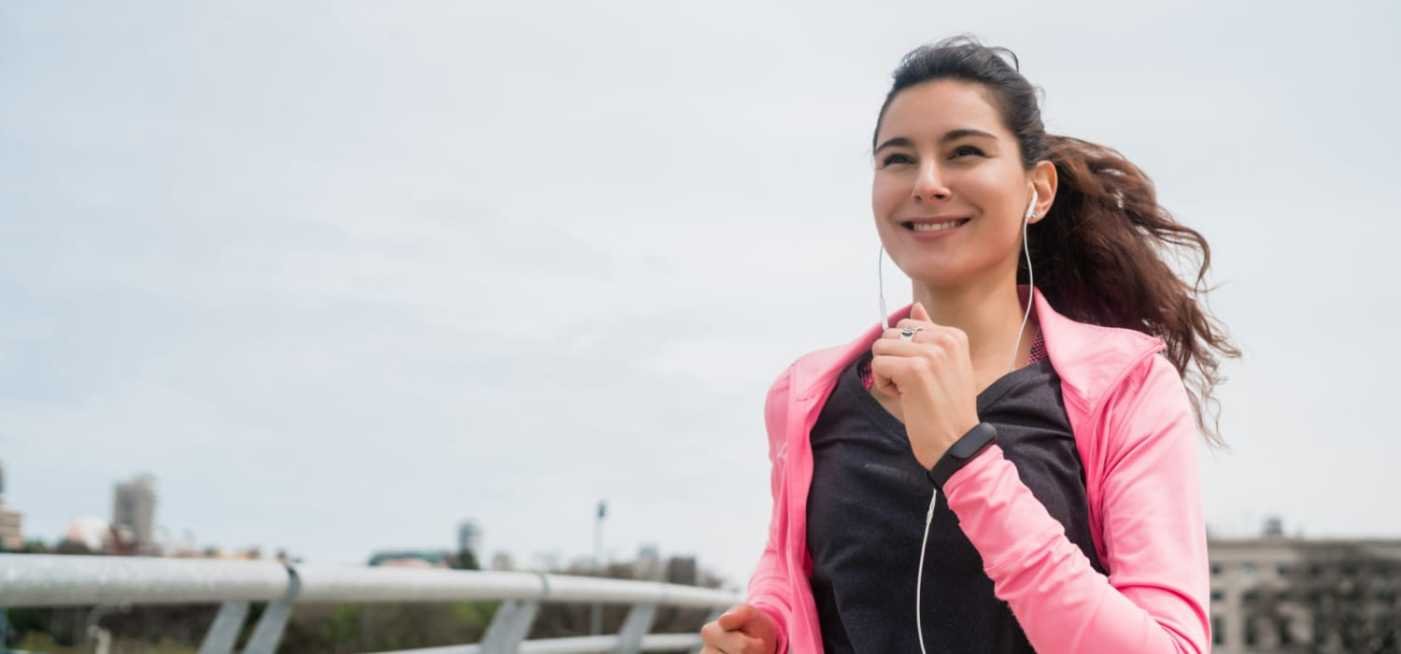 A woman jogging in the outdoors